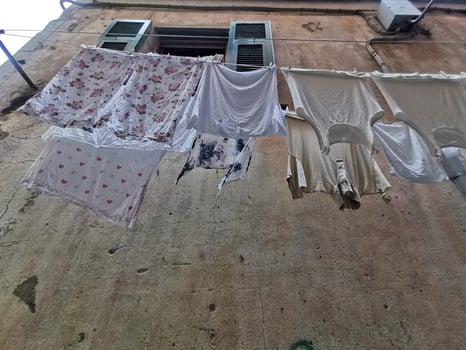 clothes hanging to dry in italian pictoresque village photo