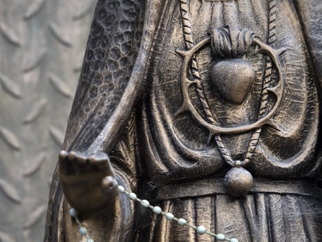 Holy madonna heart statue detail photo