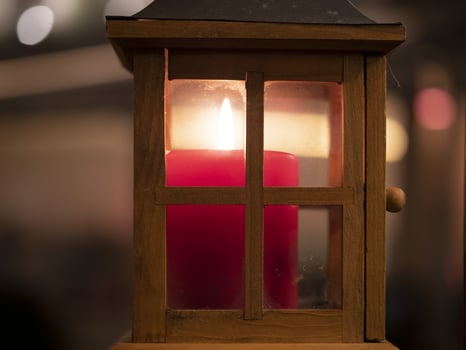 wax candle flame light on black photo