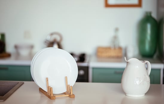 Table board and defocused modern kitchen background. photo