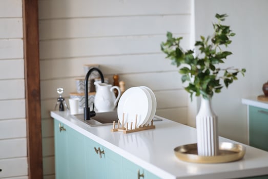 Table board and defocused modern kitchen background. photo