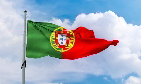 Portugal flag - realistic waving fabric flag. photo