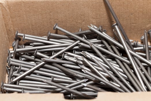 Box with nails, close up photo