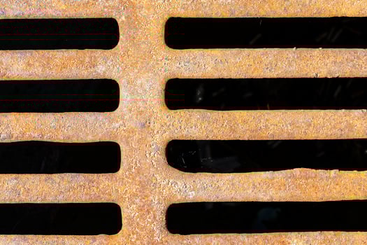 Sewer grating, close up photo