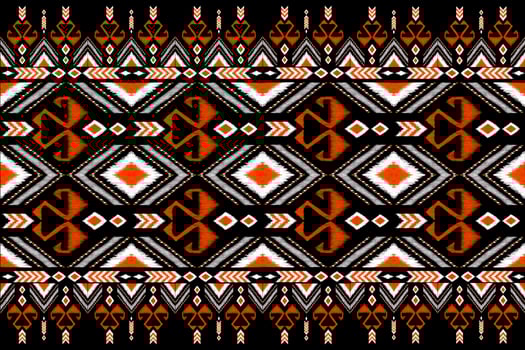 Beautiful embroidery.geometric ethnic oriental pattern traditional on black background.Aztec style,abstract,,illustration.design for texture,fabric,fashion women wearing,clothing,print. photo