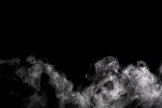 Abstract powder or smoke effect isolated on black background,Out of focus photo