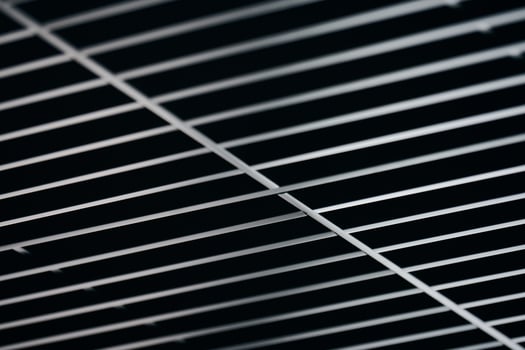 Office grille ceiling. Modern black metal grille ceiling, suspended covering. Abstract design texture. photo