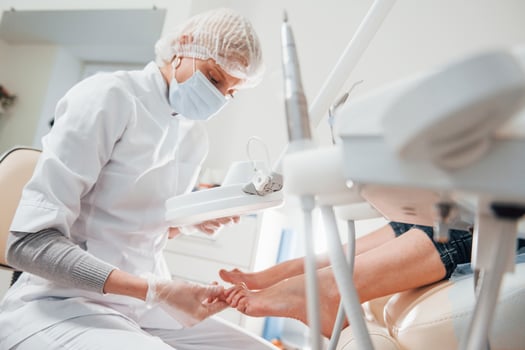 Foot treatment for Podiatry. Conception of healthcare photo