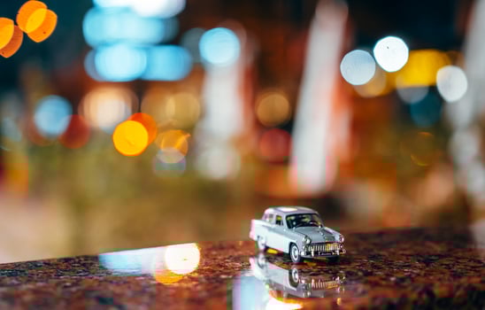 Moskvich 401 on the table, glowing background photo