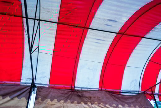 The old red and white canvas roof of the temporary building photo