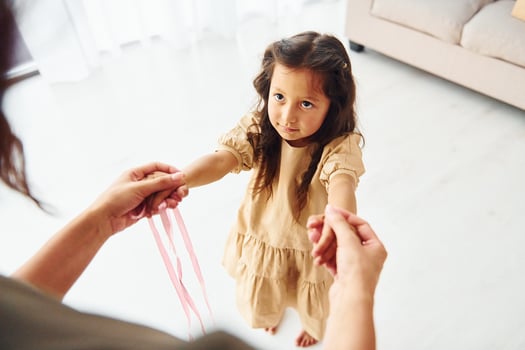 Mother and her daughter spending time together at home photo