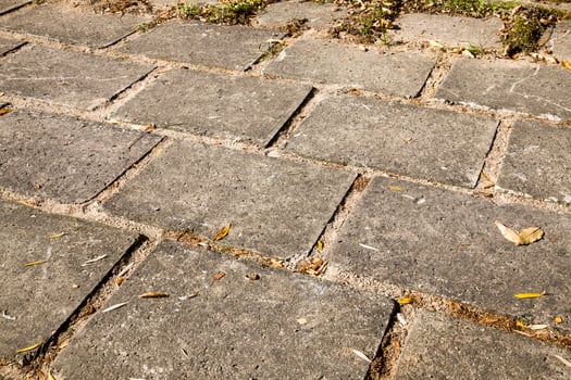 old large tiles on the road photo