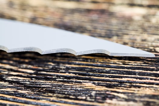 wavy blade of a steel knife photo