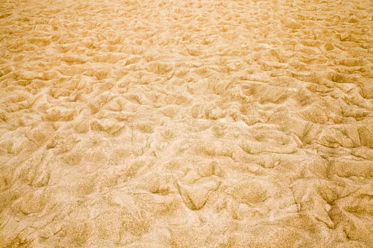wavy uneven structure of sand photo