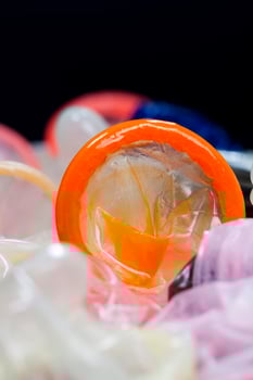 a whole orange latex condom photo
