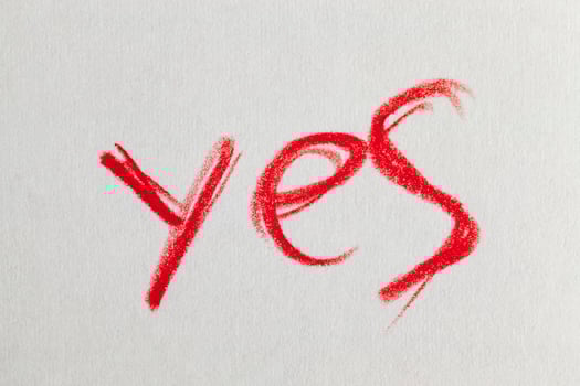 word Yes drawn in red pencil photo