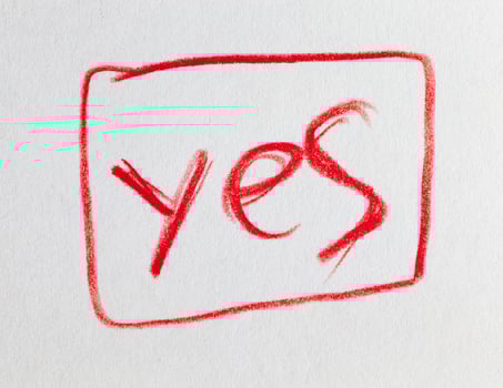 word Yes drawn in red pencil photo