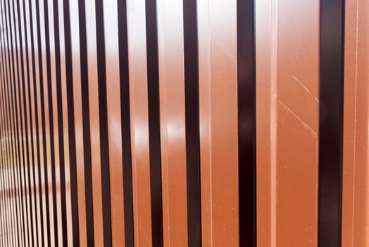 metal fences have a corrugated shape photo