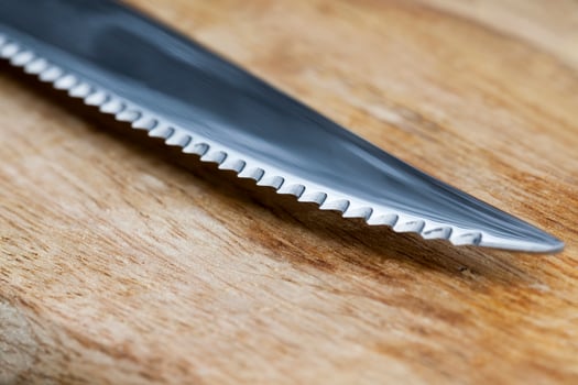 sharp metal knife blade for table setting photo