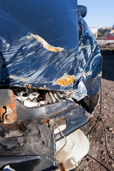 blue car after an accident photo
