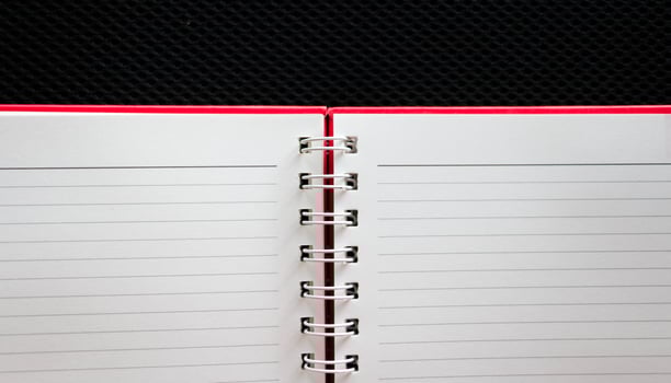 new blank notebook on desk photo