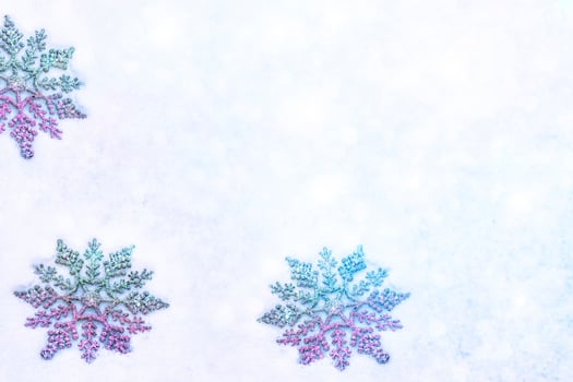 White fluffy snowflakes on snow. Winter christmas background. photo