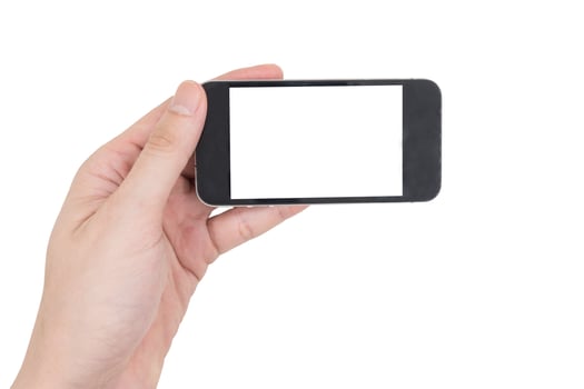 Male hand holding a mobile phone with touch blank white screen on white background. photo