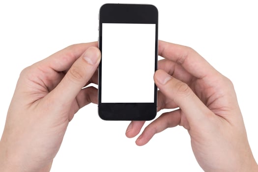 Male hands holding a mobile phone with touch blank white screen on white background. photo