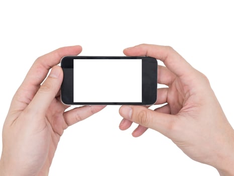 Male hands holding a mobile phone with touch blank white screen on white background. photo
