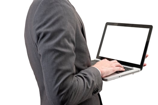 Businessman holding laptop isolated on white background. photo