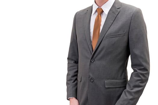 businessman in gray suit isolated on white background. photo