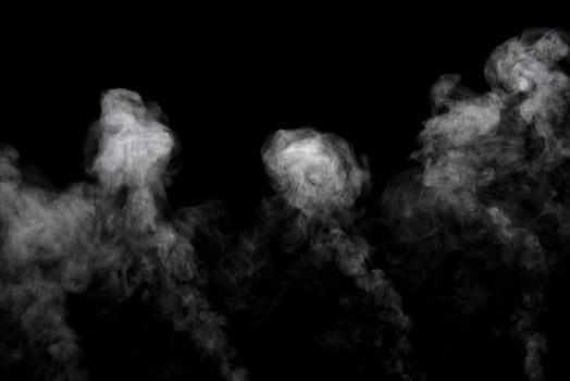 Abstract powder or smoke effect isolated on black background photo