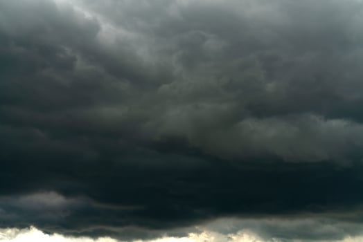 Rain clouds and black sky textured background photo
