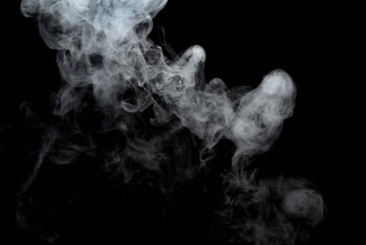 Abstract powder or smoke effect isolated on black background,Out of focus photo