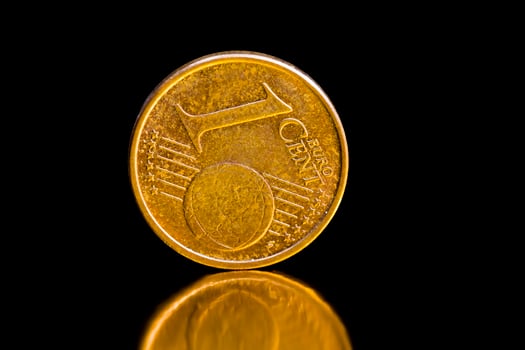 coins with a small denomination of one Euro cent photo