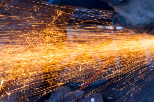 old metal surface and sawing it into parts and pieces photo