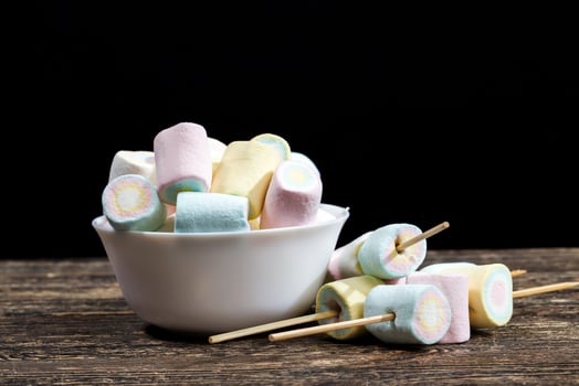 marshmallow is made in different colors of cylindrical shape photo