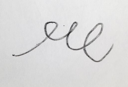 curved lines drawn in pencil on ordinary paper photo