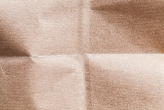 crumpled yellow paper made from recycled paper photo