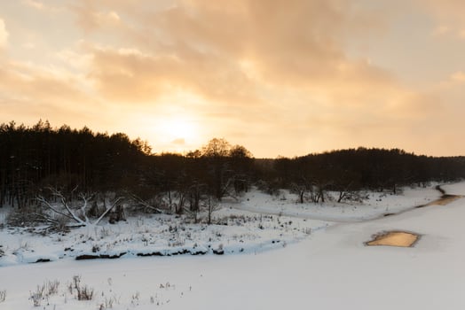 sunset with orange shades in the winter season photo