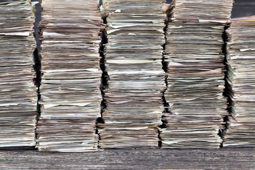 a large amount of old crumpled and dirty money photo