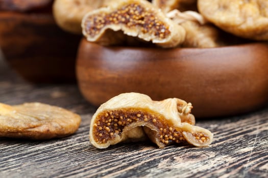 dried yellow figs close up photo