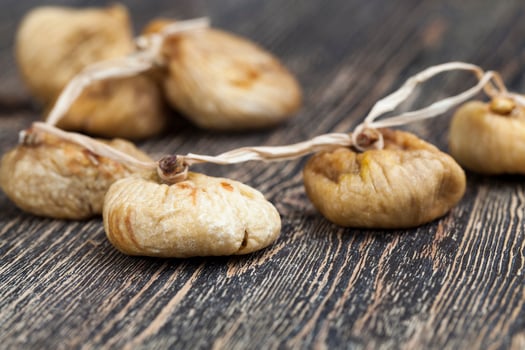 dried ripe and sweet yellow figs photo