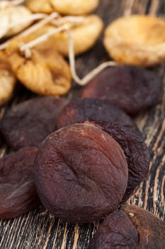 dark dried apricots of large size photo