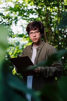 Nature protection and wildlife preservation concept. Male scientist looking at the camera photo