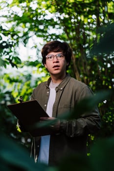 Nature protection and wildlife preservation concept. Male scientist looking at the camera photo