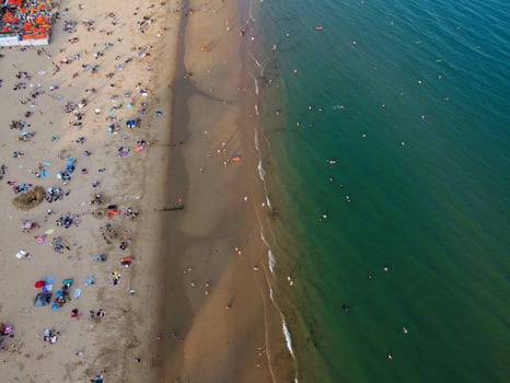 High Angle Sea View Beach Front with People at Bournemouth City of England UK, Aerial Footage of British Ocean photo