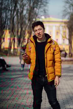 Man in yellow jacket photo