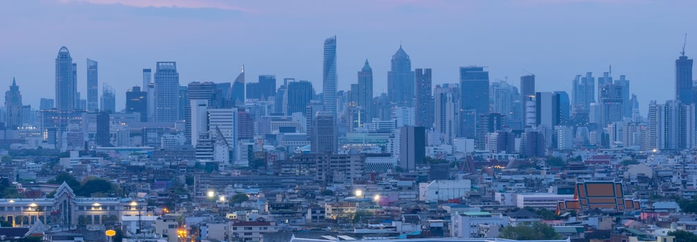 High rise office building The city centre of Bangkok. At dawn, the light from the sky is blue. photo