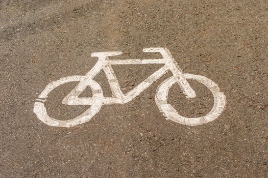 Bicycle road sign on the road. photo